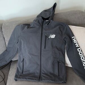 New Balance:  Gray Performance Jacket with Hood. The hood is. Not detachable.